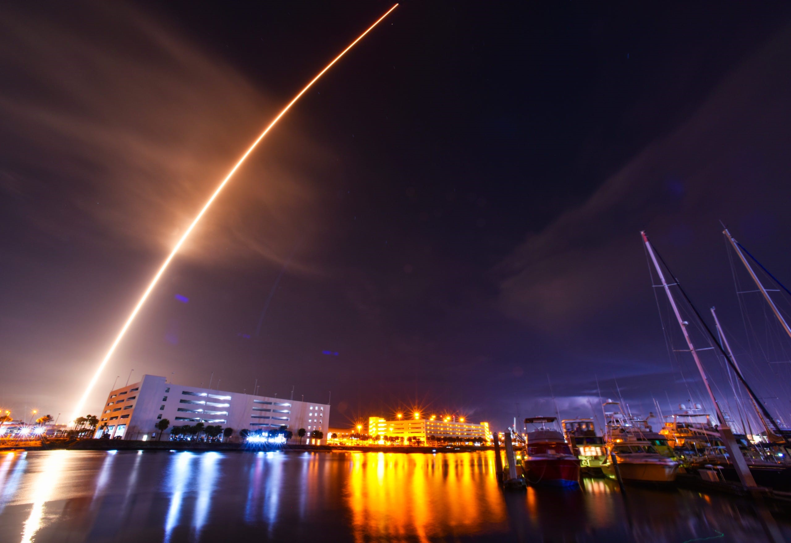 A rocket launch at night
Description automatically generated